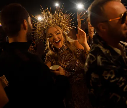 Luxury Yacht Party: Guests Celebrating with Festive Attire and Ambient Lighting